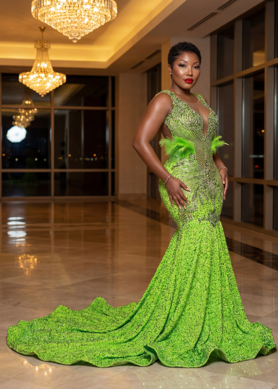 Emerald Majesty Feathered Couture Gown