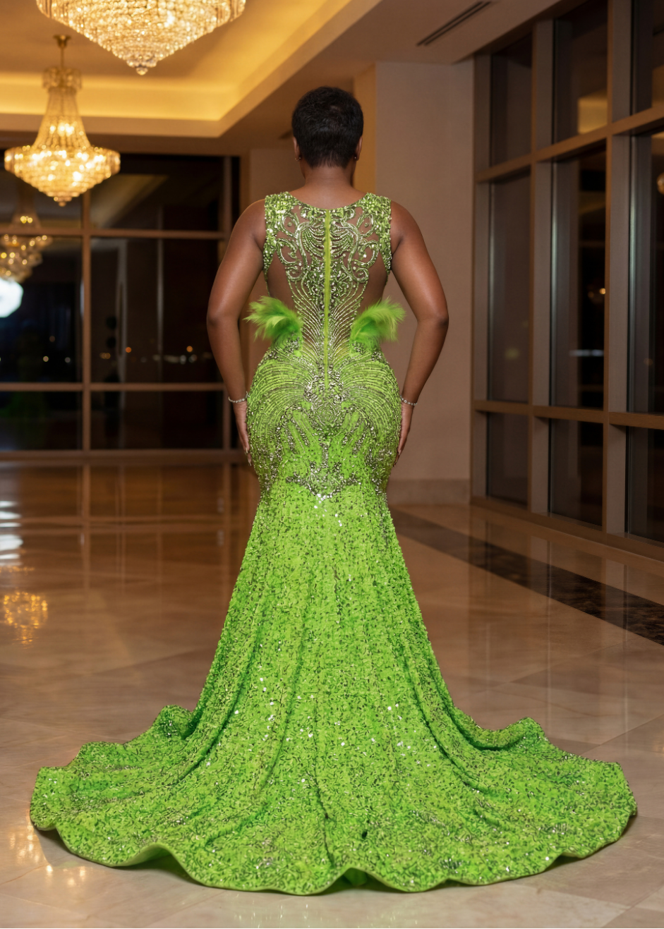 Emerald Majesty Feathered Couture Gown